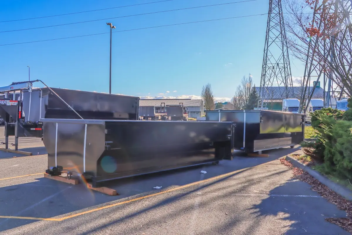 Roll-off dumpster ready for waste disposal at job site for 2 Yard Dumpster Rental in Bentonville